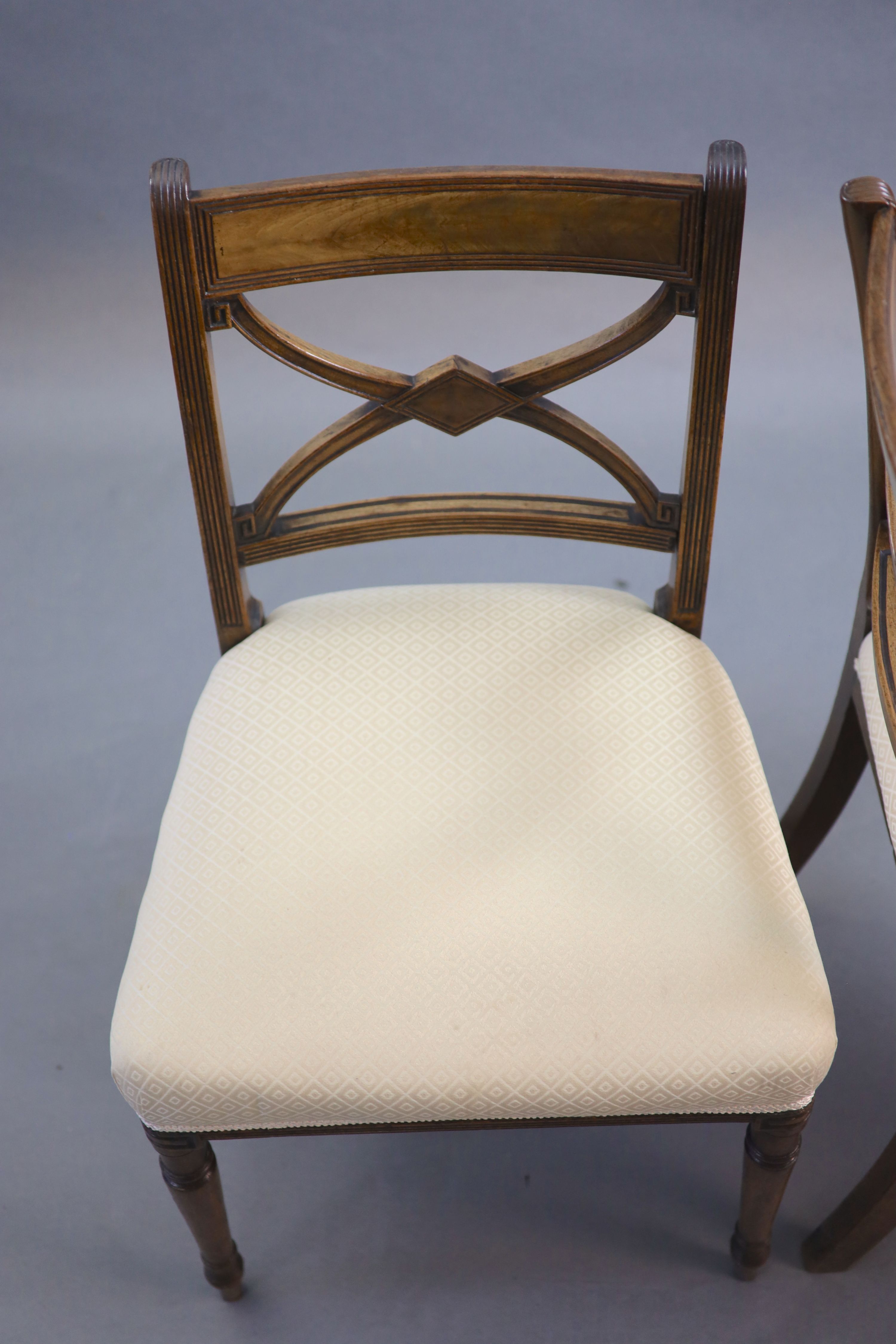 A set of six Regency mahogany dining chairs